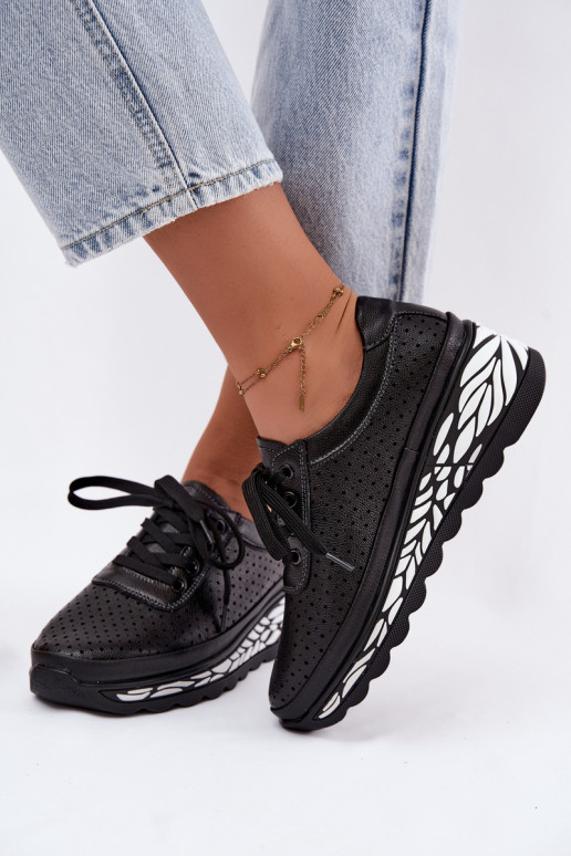 Zapatos negros para mujer con elementos calados y plataforma Morra