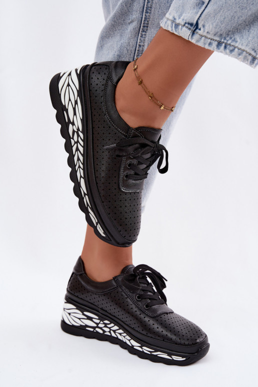 Zapatos negros para mujer con elementos calados y plataforma Morra