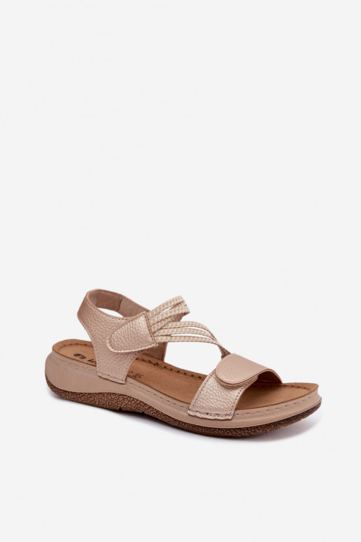 Sandalias doradas para mujer con correas elásticas