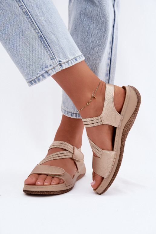 Sandalias doradas para mujer con correas elásticas