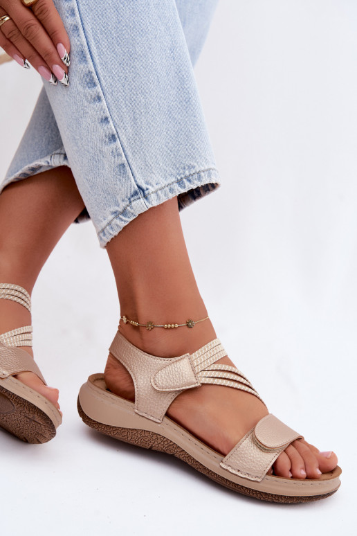 Sandalias doradas para mujer con correas elásticas