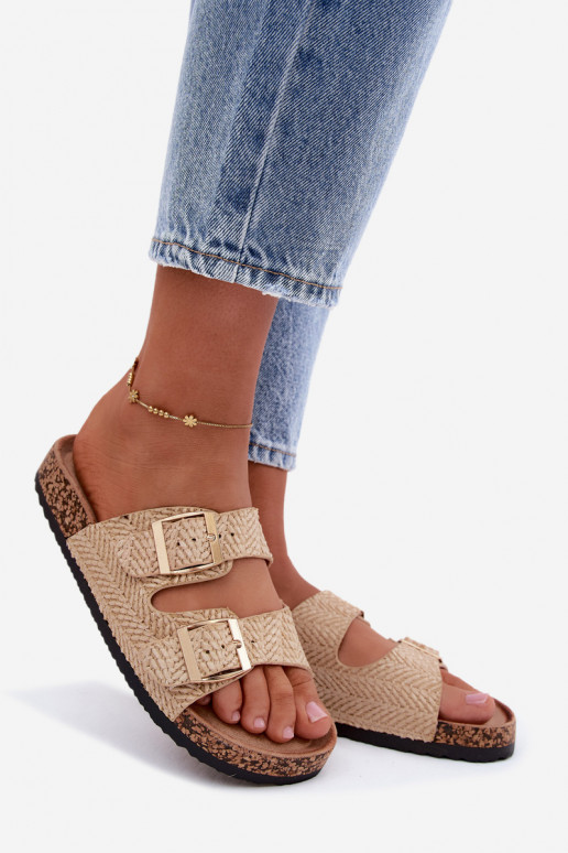 Zapatillas de mujer con trenzas y hebillas doradas en color arena Tai turignovia