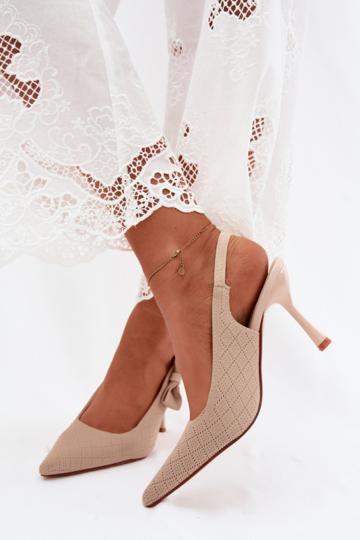 Sandalias con tacones delgados y lazos en color arena Cosma