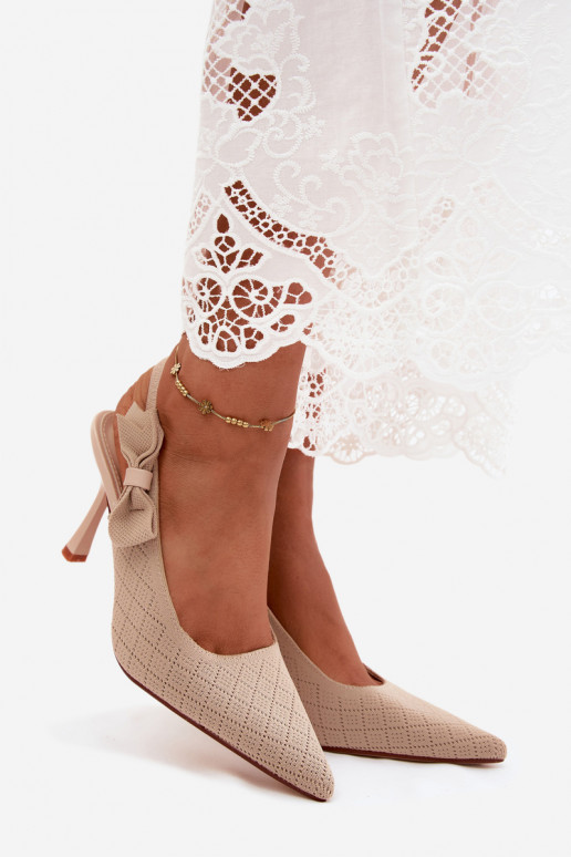 Sandalias con tacones delgados y lazos en color arena Cosma