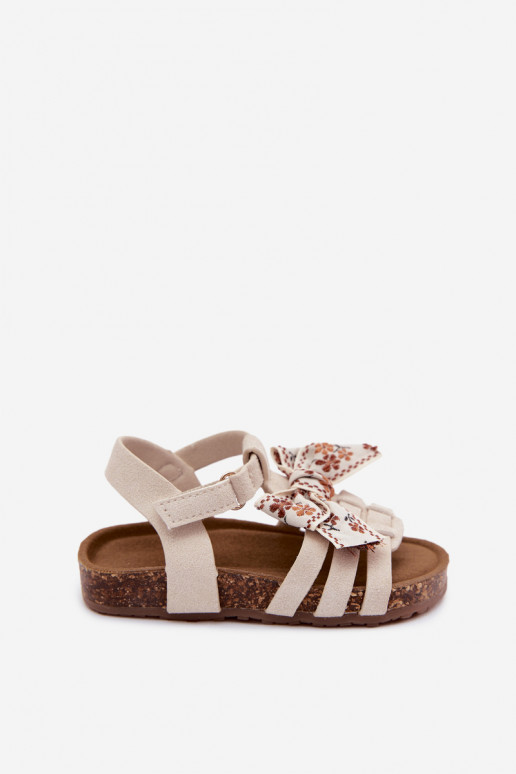 Sandalias infantiles con lazos en marfil Bessa