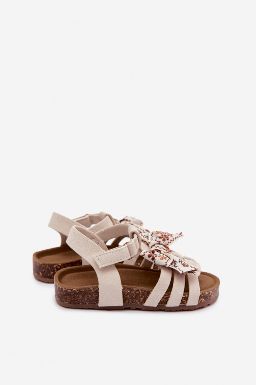 Sandalias infantiles con lazos en marfil Bessa
