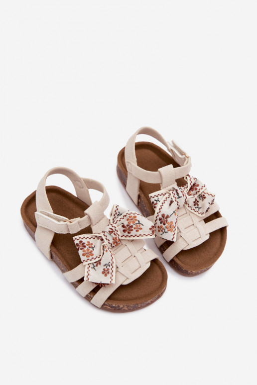 Sandalias infantiles con lazos en marfil Bessa