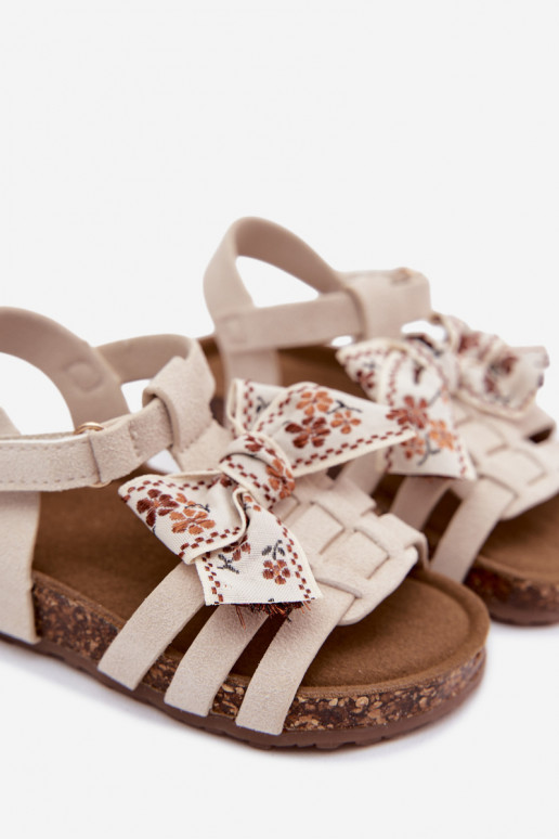 Sandalias infantiles con lazos en marfil Bessa