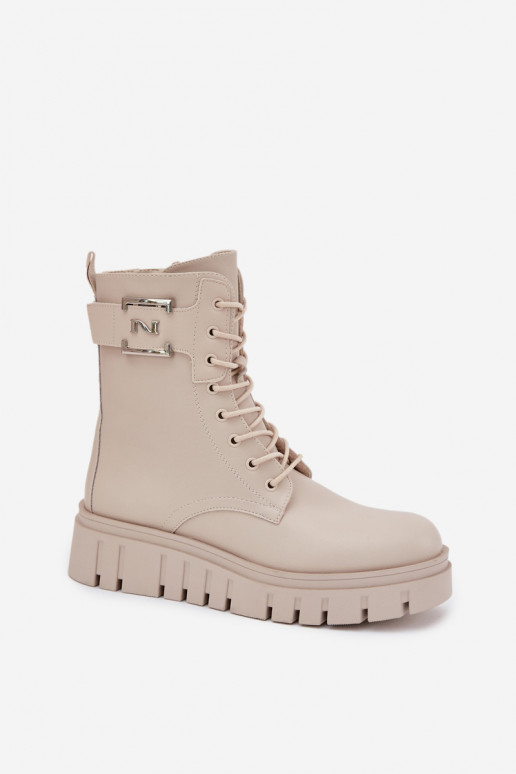 Botines aislados con plataforma y detalles decorativos en marfil Lyrana