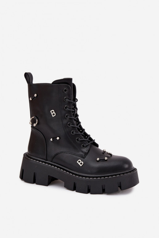 Botines de trabajo para mujer con bonitos detalles aislados en negro Lunea