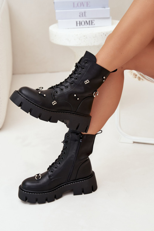 Botines de trabajo para mujer con bonitos detalles aislados en negro Lunea