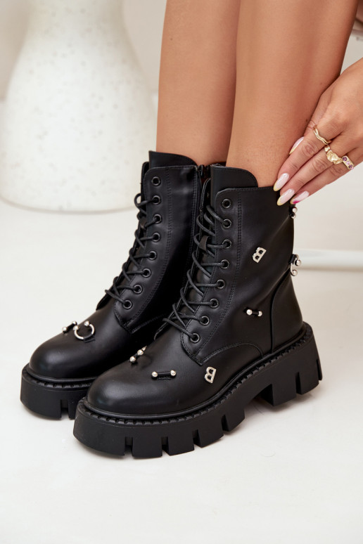 Botines de trabajo para mujer con bonitos detalles aislados en negro Lunea