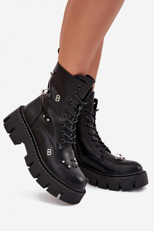 Botines de trabajo para mujer con bonitos detalles aislados en negro Lunea