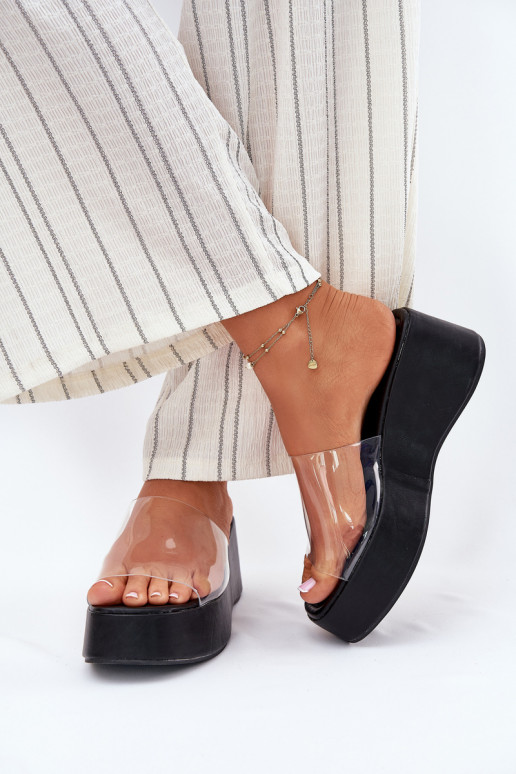 Zapatillas de mujer negras con tiras transparentes en la plataforma Meltiana