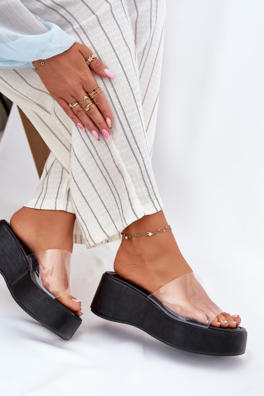 Zapatillas de mujer negras con tiras transparentes en la plataforma Meltiana