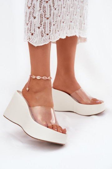 zapatillas de mujer con una plataformaTransparentnym Tirasem el color blanco Zolretia