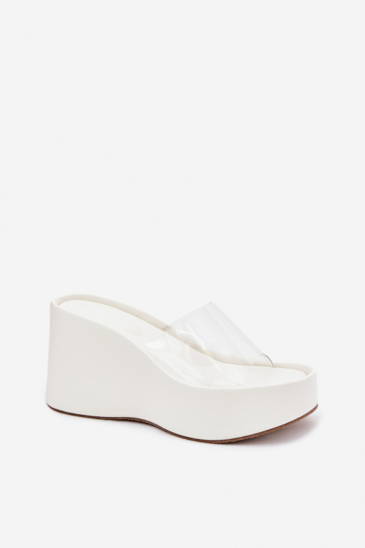Zapatillas de mujer blancas con tiras transparentes en la plataforma Zolretia