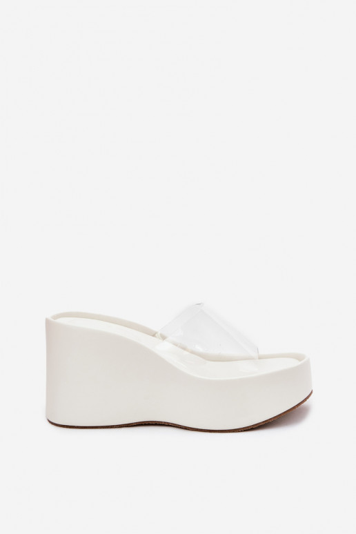 Zapatillas de mujer blancas con tiras transparentes en la plataforma Zolretia