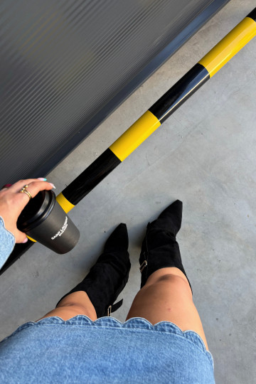 Botas negras de mujer hasta la rodilla con tacones y hebillas Caster