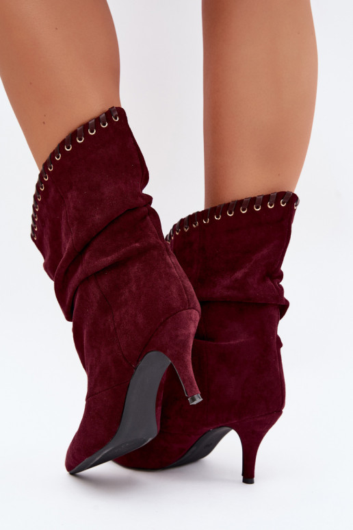 Botines arrugados con tacones finos en color burdeos Herella