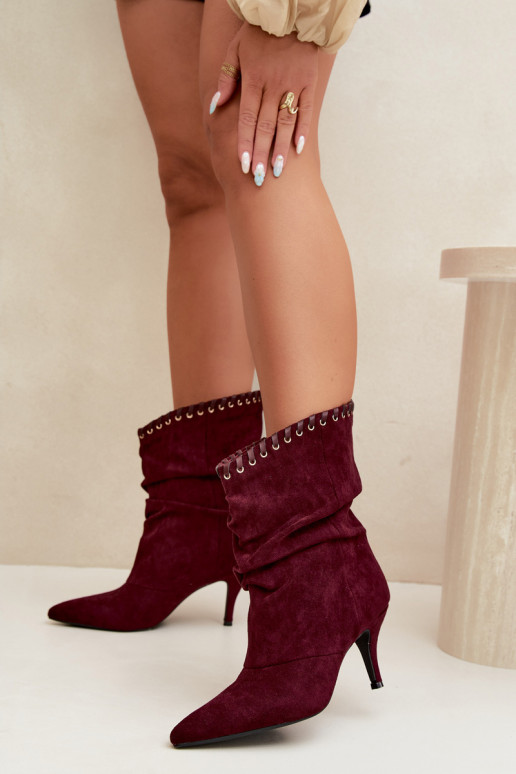 Botines arrugados con tacones finos en color burdeos Herella