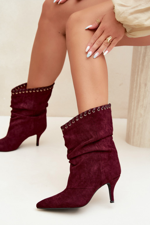 Botines arrugados con tacones finos en color burdeos Herella