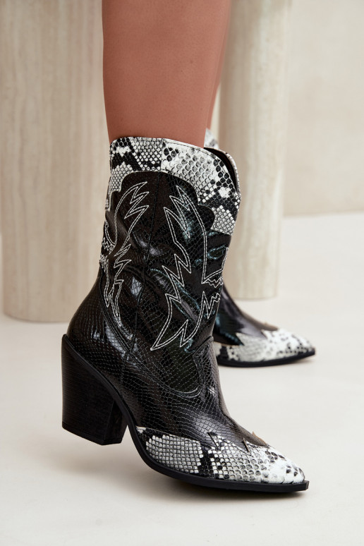 botines de estilo cowboy con forro de piel sintética y detalle en relieve en negro y blanco Ambery