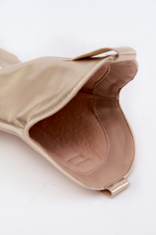 botas altas de estilo vaquero con tacones en color dorado