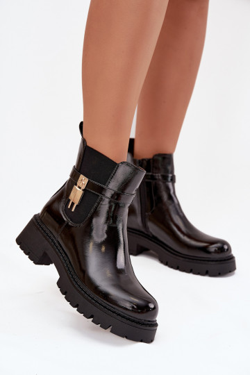 Botines aislados y elegantes con detalles Ze dorados y negros Talyra 2