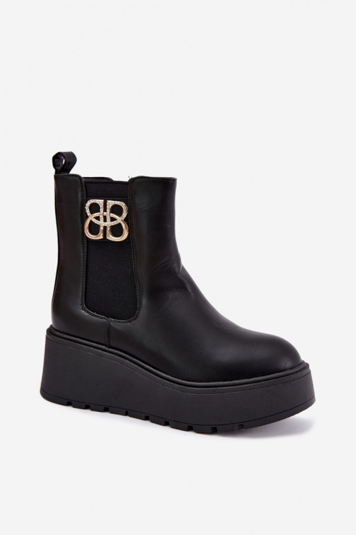 Botines cálidos y elegantes con plataforma y detalles decorativos en negro Solavie