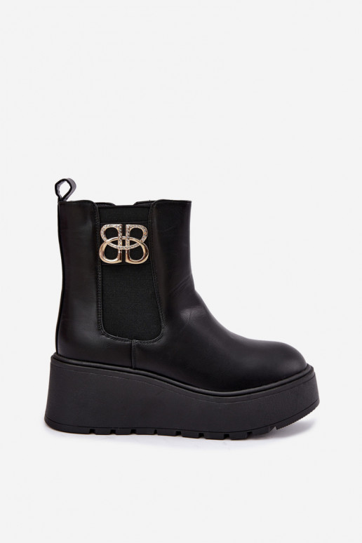 Botines cálidos y elegantes con plataforma y detalles decorativos en negro Solavie