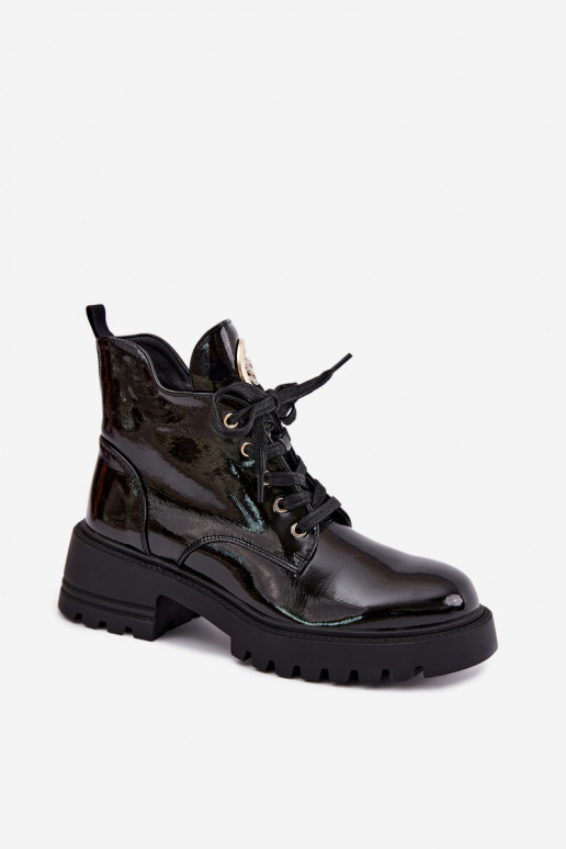 Botines cálidos con efecto charol y detalles dorados en negro Kavirae
