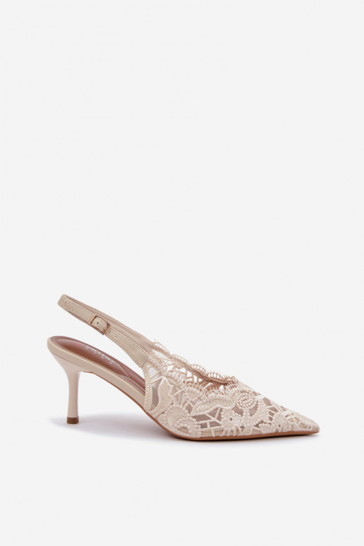 Sandalias con cordones y tacones finos en color marfil Talmeria