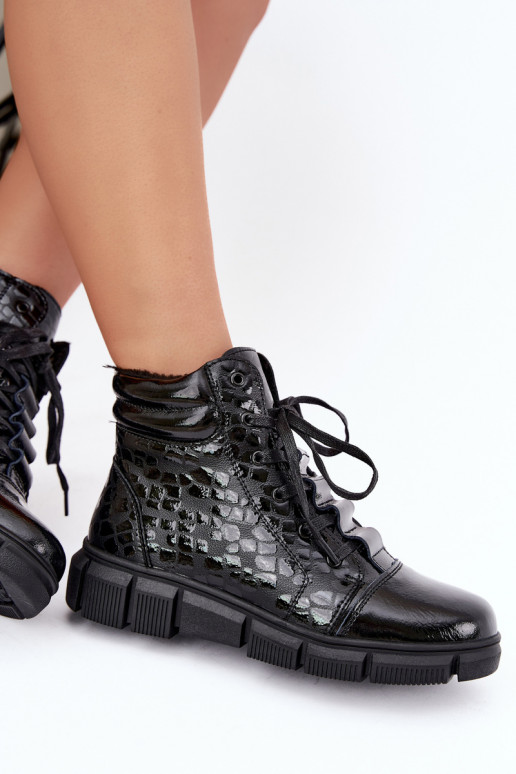 Botines aislados para mujer de piel sintética con efecto charol negro Canelia