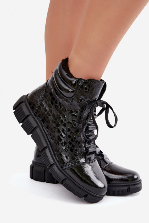 Botines aislados para mujer de piel sintética con efecto charol negro Canelia