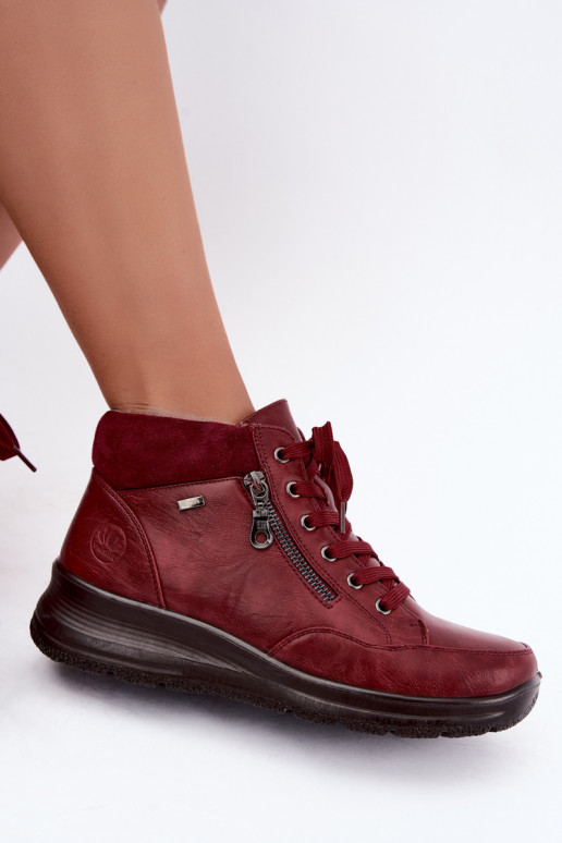 Botines aislados de mujer con pelo por dentro en color burdeos Parvella