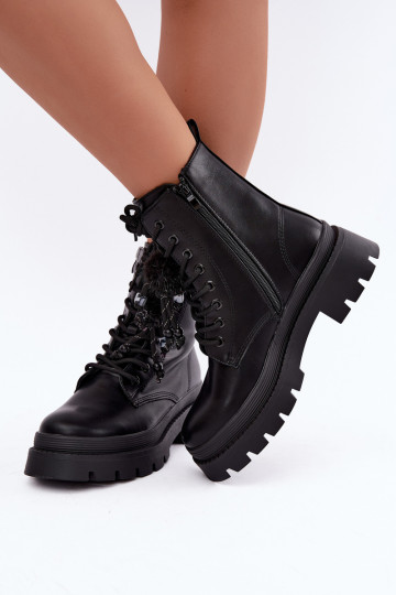 botas aisladas con pompones esponjosos en negro Faresse 2