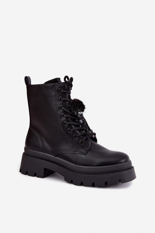 botas aisladas con pompones esponjosos en negro Faresse