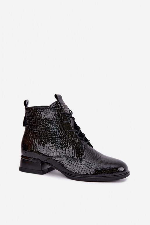 Botines con efecto charol y relieve aislados en negro Vinceza 58659