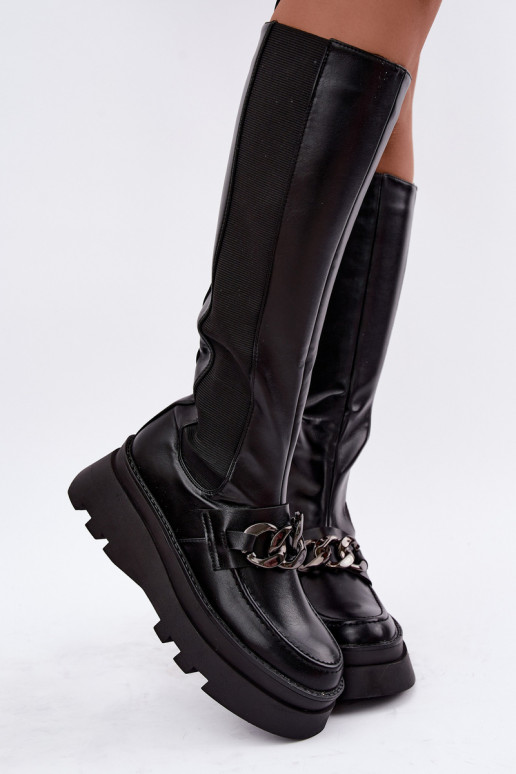botas altas forradas con plataforma y cadenas en color negro Koraia