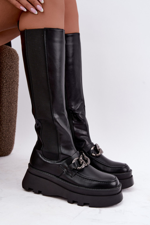 botas altas forradas con plataforma y cadenas en color negro Koraia