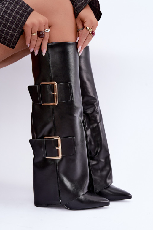 Botas altas aisladas Olympe con hebillas doradas en negro