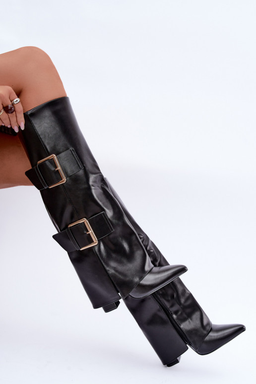 Botas altas aisladas Olympe con hebillas doradas en negro