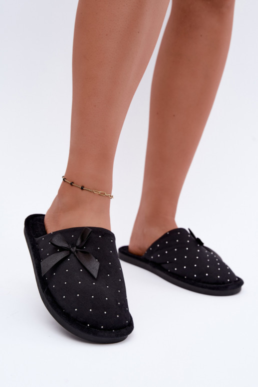 Zapatillas decoradas con lazos negros Loriane