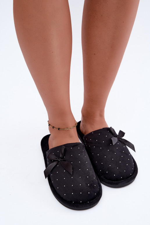 Zapatillas decoradas con lazos negros Loriane