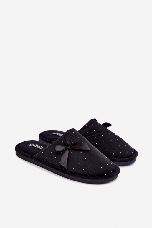 Zapatillas decoradas con lazos negros Loriane