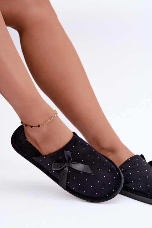 Zapatillas decoradas con lazos negros Loriane