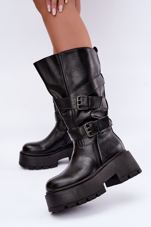 Botas altas con plataforma y correas en negro Delsenne