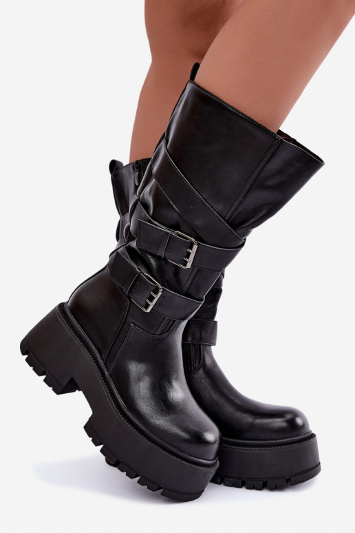 Botas altas con plataforma y correas en negro Delsenne