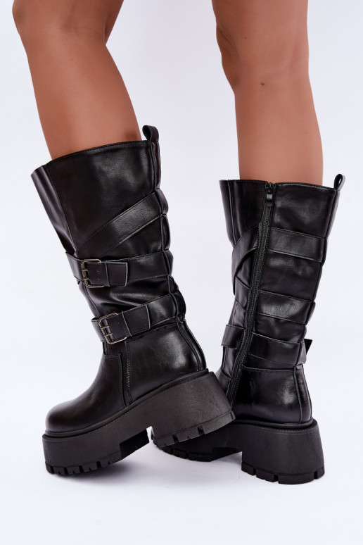 Botas altas con plataforma y correas en negro Delsenne